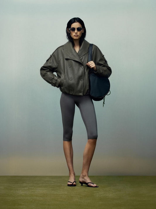 Oversized Black Faux Leather Jacket with Wide Lapels and Buckle Cuffs